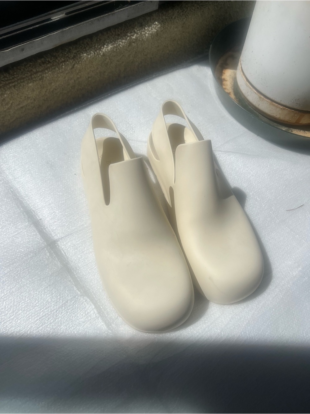 Bottega Veneta puddle slip ons